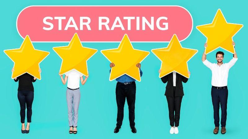 Your business website needs customer review page - different people holding up star rating sign